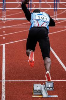 athletic's on starting line during daytime by Nicolas Hoizey courtesy of Unsplash.